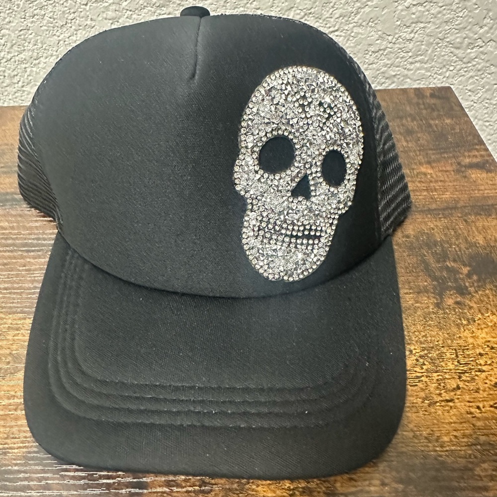 Black Trucker Hat with Rhinestone Skull Design